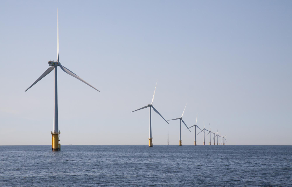 Offshore Development Center Australia concept with offshore wind turbines in ocean representing sustainable infrastructure
